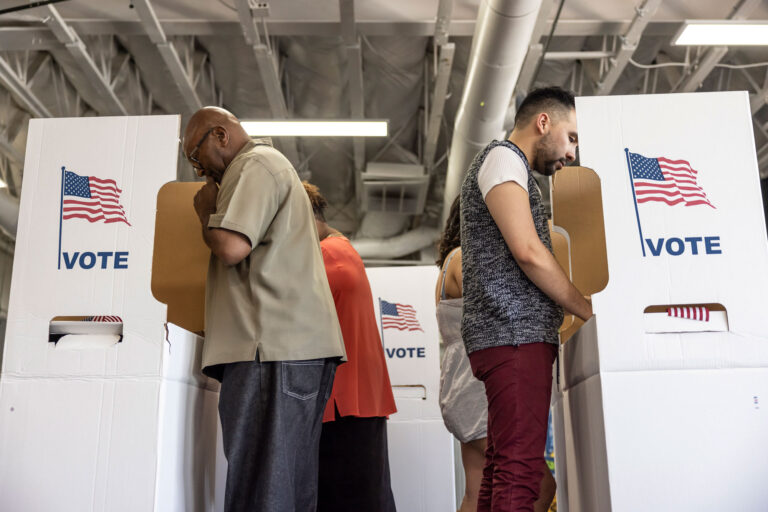 People voting at a polling station