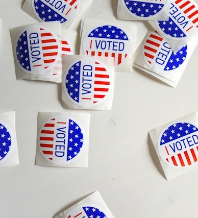 Several I Voted stickers on a white background